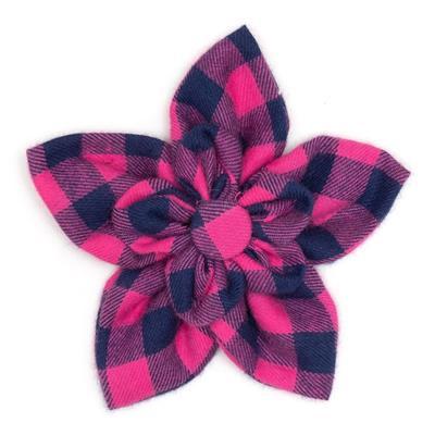 Pink and navy checkered flower-shaped hair clip on a white background