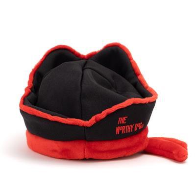 Black and red pet hat with a small tag on a white background