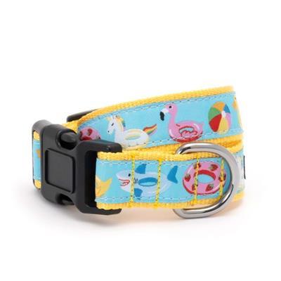 Dog collar with beach-themed design on a white background