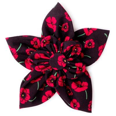 Floral fabric flower with red flowers on a black background