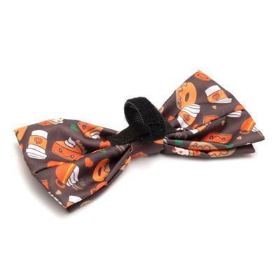 Brown dog bow tie with patterns of coffee, pumpkin pie and fall with black Velcro band on white background
