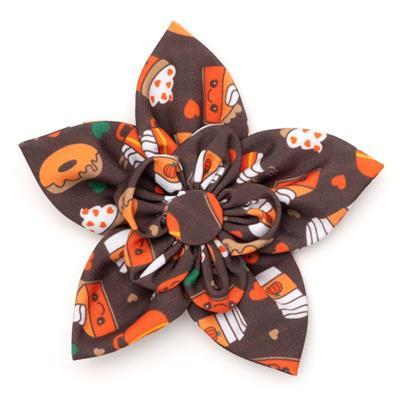 Fall-themed fabric flower with pumpkins, coffee, and pie on a white background