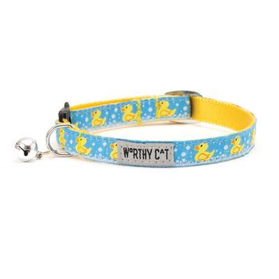Blue cat collar with yellow ducks and bell on white background