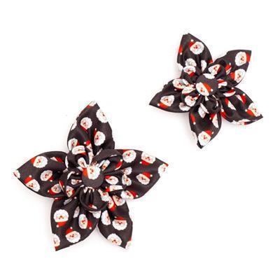 Two black collar bows with Santa Claus pattern on a white background