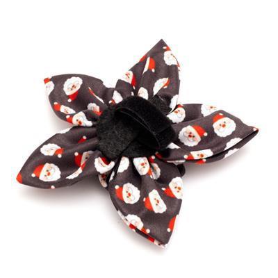 Black collar flower bow with Santa Claus pattern and black Velcro closure on a white background