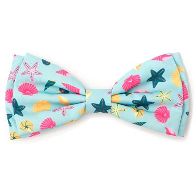 Colorful bow tie with starfish and shell pattern on a light blue background