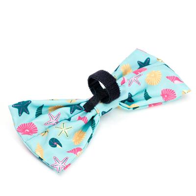 Bow tie with sea-themed pattern and velcro closure on a white background