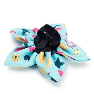 Colorful collar bow with sea-themed design and Velcro touch closure on a white background