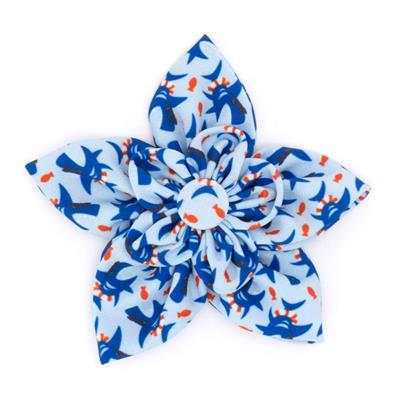Blue and white collar flower with blue shark accents on a white background