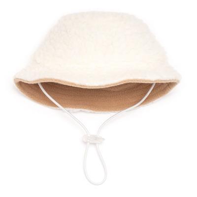 Beige dog hat with a white drawstring on a white background