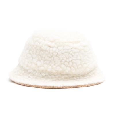 White textured bucket hat on a white background