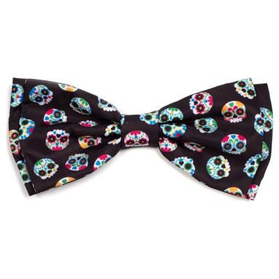 Bow tie with colorful skull pattern on a black background