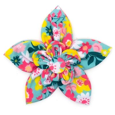 Colorful floral-patterned hair clip on a white background