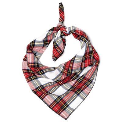 Plaid scarf tied in a knot on a white background