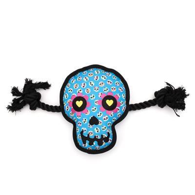 Dog toy shaped like a skull with floral patterns and black rope on a white background