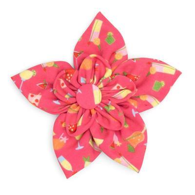 Colorful flower-shaped collar flower with a pink background