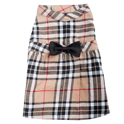 Plaid dress with a black bow on a white background