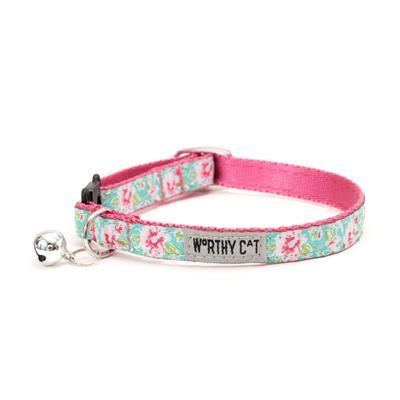 Cat collar with floral pattern and pink border and bell on a white background
