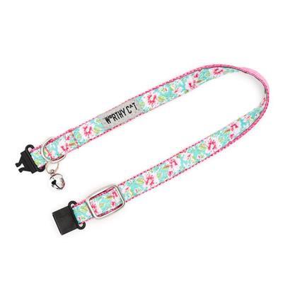 Floral patterned cat collar with a clip and bell on a white background