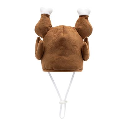 Brown plush toy resembling a turkey with white paws on a white background