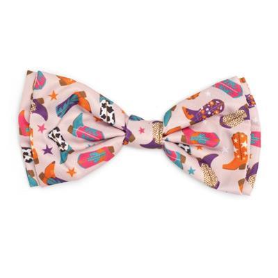 Colorful bow tie with western themed print on a white background