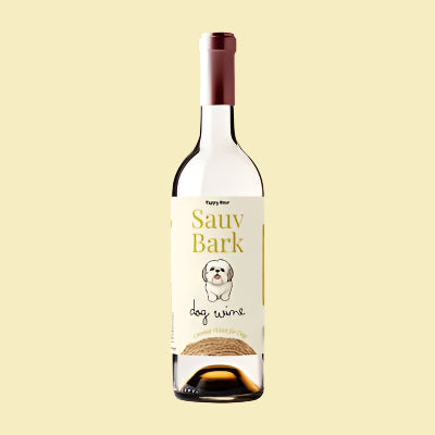 Bottle of 'Sauv Bark' dog wine with a label featuring a dog illustration on a beige background