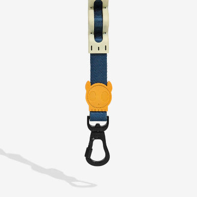 Dog leash with yellow clip and blue strap on a white background