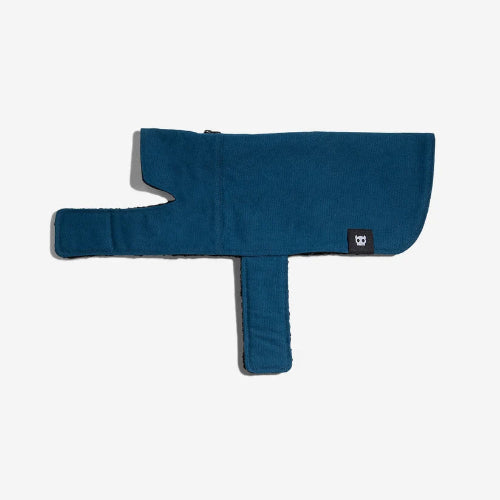 Blue blanket style dog coat with velcro closures on white background.