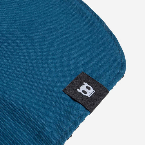 Zee.Dog logo on blue fabric on white background