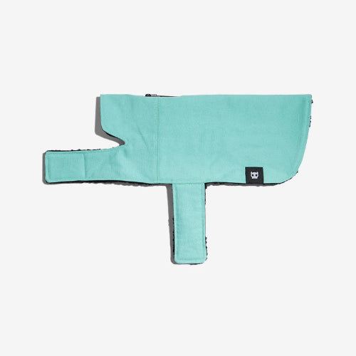 Mint green blanket style dog coat with velcro closures on white background.