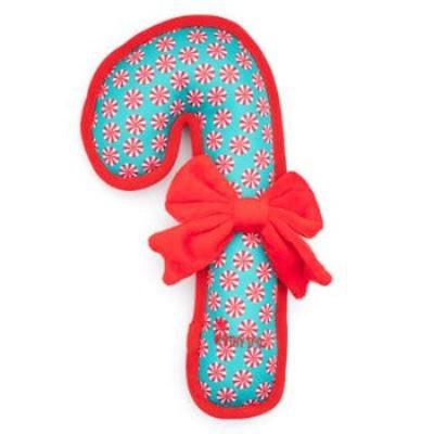 candy cane shaped toy with peppermint candies pattern trimmed in red with red bow on white background