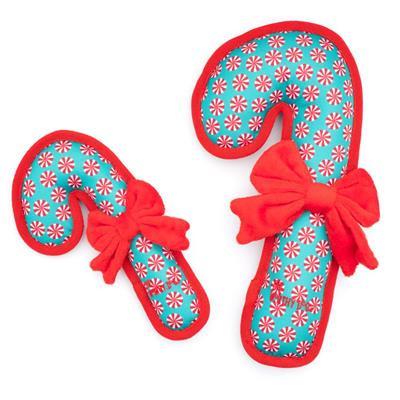 Small and large sizes of candy cane shaped toy with peppermint candies pattern trimmed in red with red bow on white background